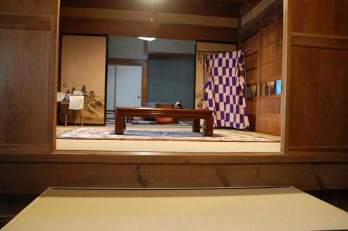 a room with a table in the middle of a room at Tabinoya - Vacation STAY 69884v in Kakegawa