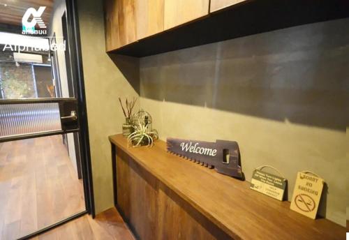 a welcome sign on a counter in a room at Alphabed SunportTakamatsu 701 / Vacation STAY 21860 in Takamatsu