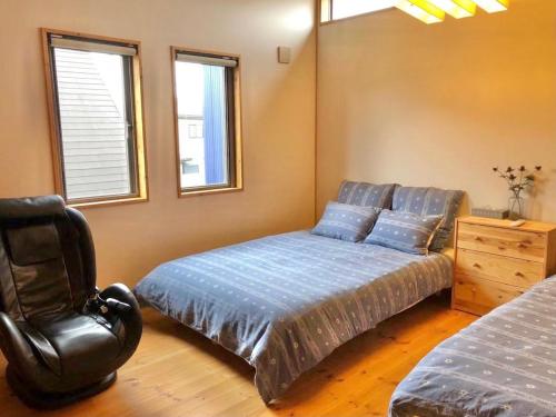 Postel nebo postele na pokoji v ubytování BALLAD HOUSE / Vacation STAY 27536
