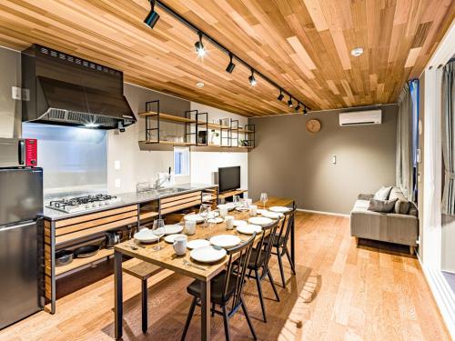 a kitchen and dining room with a table and chairs at Rakuten STAY HOUSE x WILL STYLE Takasaki 104 in Takasaki