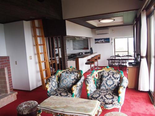 a living room with two chairs and a table at Private - Villa - tsubasa- Vacation STAY 4192 in Kimitsu