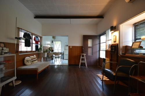 a living room with a couch and a table at Fukuoka - House - Vacation STAY 4674 in Fukuoka