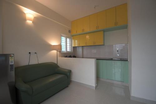 O bucătărie sau chicinetă la Dhriti - 1BHK and 2 BHK Apartment stay