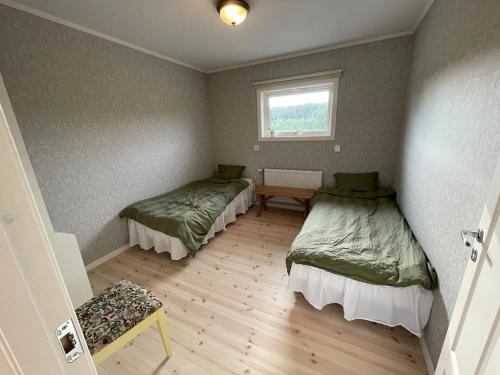 Apartment on a farm with lake viewにあるベッド