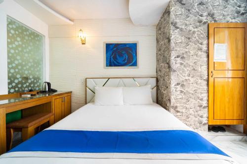 Postel nebo postele na pokoji v ubytování Belvilla Near Lotte Mart Formerly Sunrise Hotel Trung Son