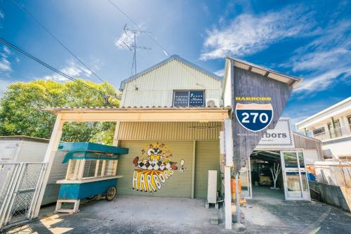 a garage with a speed limit sign in front of it at Harbors - Vacation STAY 54826 in Beppu