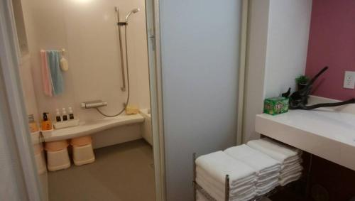a bathroom with a shower and a sink and a toilet at Hidaka-gun - House - Vacation STAY 99266v in Haneda