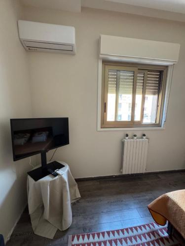 Μια τηλεόραση ή/και κέντρο ψυχαγωγίας στο A Casa Di Teo tra stazione e mare