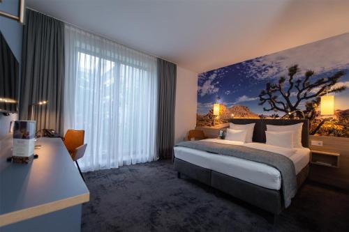 Ein Bett oder Betten in einem Zimmer der Unterkunft Best Western Hotel Wiesbaden