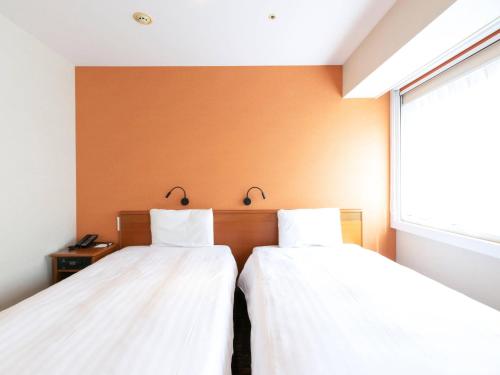 Letto o letti in una camera di Comfort Inn Tokyo Roppongi