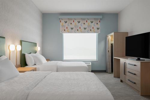 Postel nebo postele na pokoji v ubytování Home2 Suites By Hilton Kearney