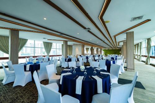 a banquet hall with tables and chairs in a room at Hotel El Panama by Faranda Grand, a member of Radisson Individuals in Panama City