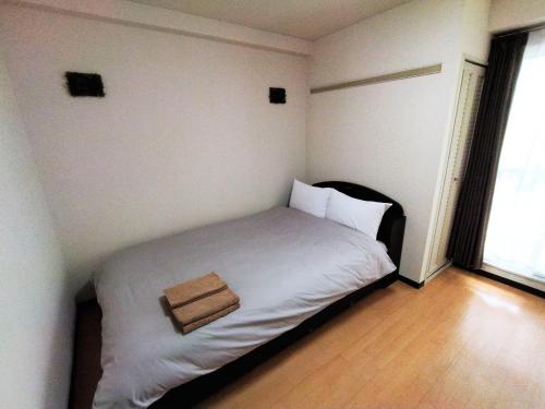 Postel nebo postele na pokoji v ubytování Presant South 8 West 1 / Vacation STAY 5822