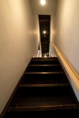 an empty stairway with a stair case in a building at Ebisuya / Vacation STAY 5851 in Kofu