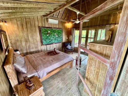 Cama o camas de una habitación en Junjungan Suite