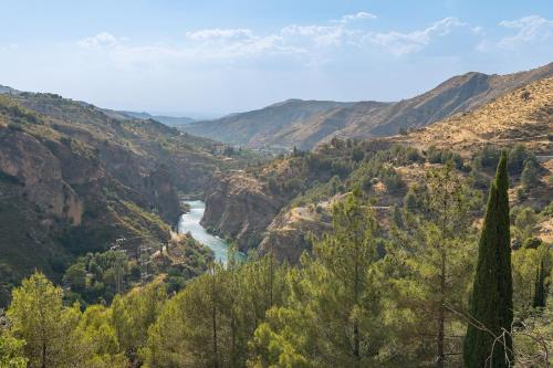 a view of a river in a canyon at Alicia's House in Granada