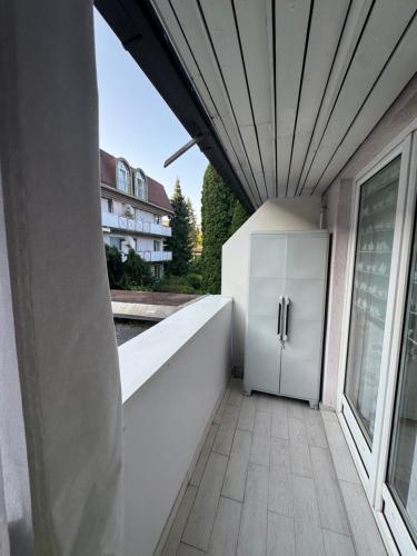 a hallway of a house with a white door at Wilena Apartments in Villach