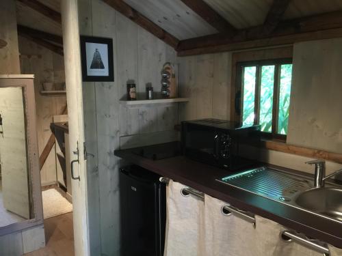 Dapur atau dapur kecil di Lodging Le Lac
