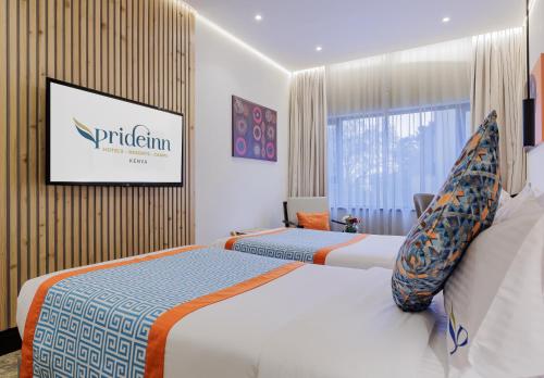 Katil atau katil-katil dalam bilik di PrideInn Westlands Luxury Boutique Hotel