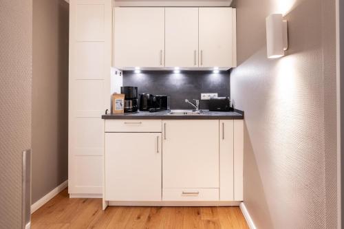 Dapur atau dapur kecil di Logierhaus K15 Appartement 3