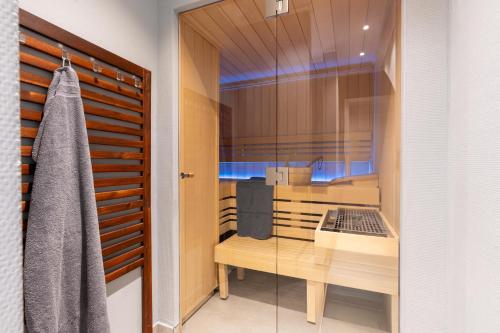 a bathroom with a desk with a laptop on it at Ferienwohnung 2 K20 in Borkum
