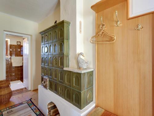 a green cabinet in a room with a bathroom at Holiday Home in Styria near Thermal Spas in Gersdorf an der Feistritz