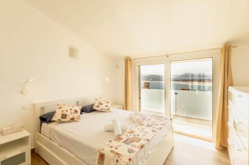 Ένα ή περισσότερα κρεβάτια σε δωμάτιο στο Villa Melia