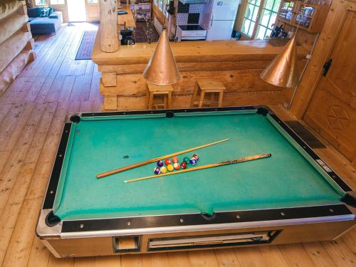 a pool table with chopsticks on top of it at 8 person holiday home in Ebeltoft in Ebeltoft