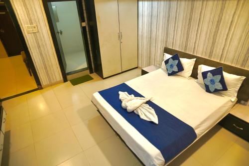 Ένα ή περισσότερα κρεβάτια σε δωμάτιο στο Hotel Pride