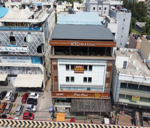 an overhead view of a city with buildings at Hotel Delphi Grand Hyderabad - Hi-Tech City, Perfect for Business & Comfort in Hyderabad