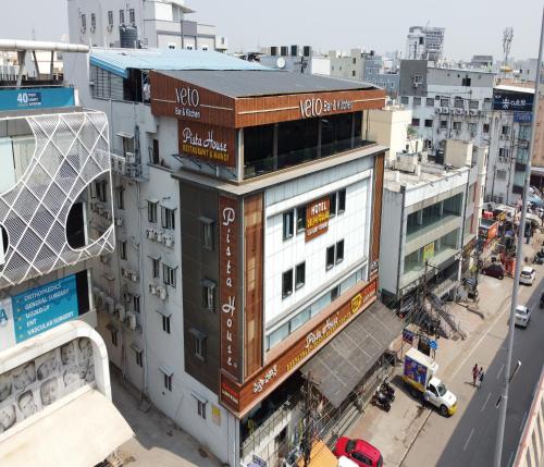 an overhead view of a building in a city at Hotel Delphi Grand Hyderabad - Hi-Tech City, Perfect for Business & Comfort in Hyderabad
