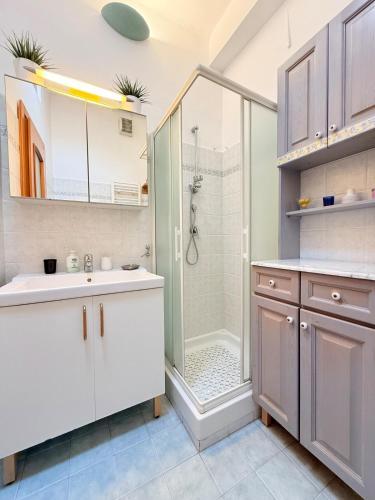 a bathroom with a shower and a sink at DIMORA Concept-Virginia-Spacious Apartment 50m from the Beach in Finale Ligure