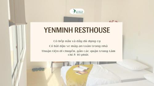 a sign for a room with a bed and a sign for aennaennis house at Yen Minh Resthouse in Ho Chi Minh City