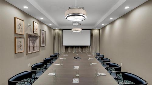 a long conference room with a long table and chairs at Hampton Inn & Suites by Hilton Toronto Markham in Markham