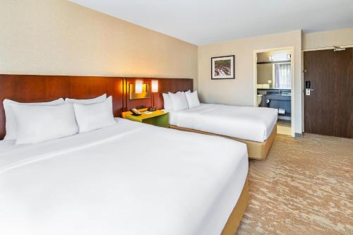 Ένα ή περισσότερα κρεβάτια σε δωμάτιο στο Comfort Inn