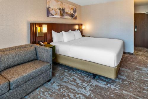 Ένα ή περισσότερα κρεβάτια σε δωμάτιο στο Comfort Inn