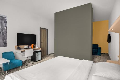 TV a/nebo společenská místnost v ubytování Park Inn By Radisson Budapest