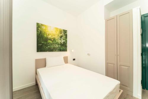 Postel nebo postele na pokoji v ubytování To Home 1 Piano