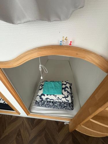 a bunk bed with a cake on top of it at 赤坂ホステル in Tokyo