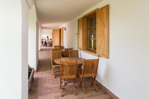 a dining room with a table and chairs at Figula Vendégház in Balatonfüred