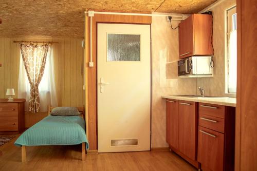 Una cocina o cocineta en Nova Mazury