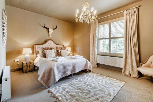 Ένα ή περισσότερα κρεβάτια σε δωμάτιο στο 6 Bed in Cowlinge oc-b32762