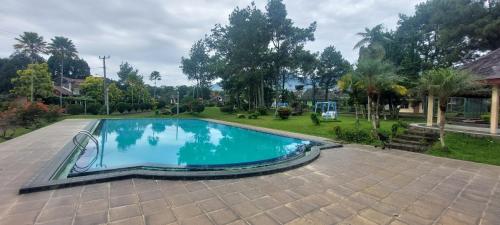 Πισίνα στο ή κοντά στο Villa Segar Alam Puncak