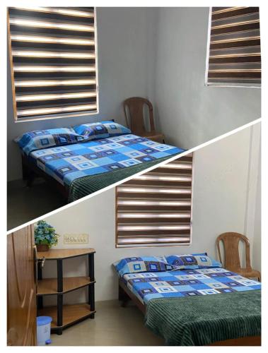 two beds in a room next to a table at River Soul Villa, Vagamon in Kattappana