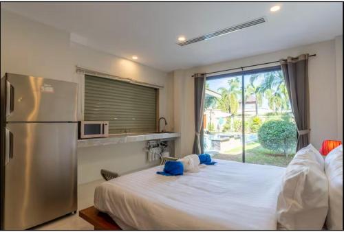 Postel nebo postele na pokoji v ubytování Beautiful 5BR Villa With Temperature Control Pool