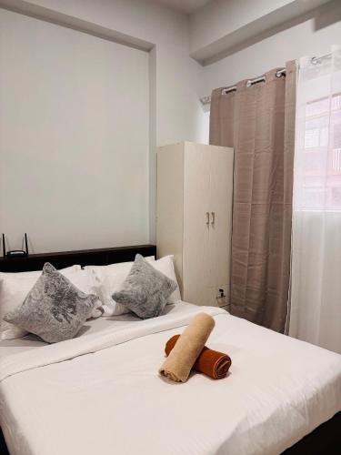 Inviting Space for Rest Relaxationにあるベッド