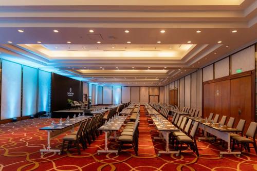 a large banquet hall with tables and chairs at Sheraton Lima Historic Center in Lima