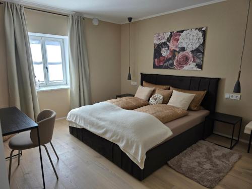 Postel nebo postele na pokoji v ubytování Kavaliershaus Wallerstein