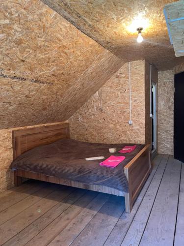 Ένα ή περισσότερα κρεβάτια σε δωμάτιο στο Guesthouse Malat