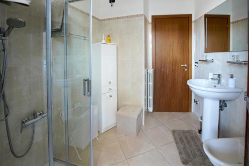 a bathroom with a shower and a sink at Nuvole&Lenzuola in Pescara